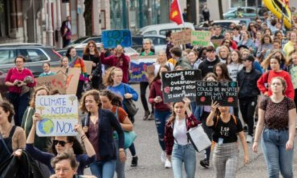 a group of people at a climate protest