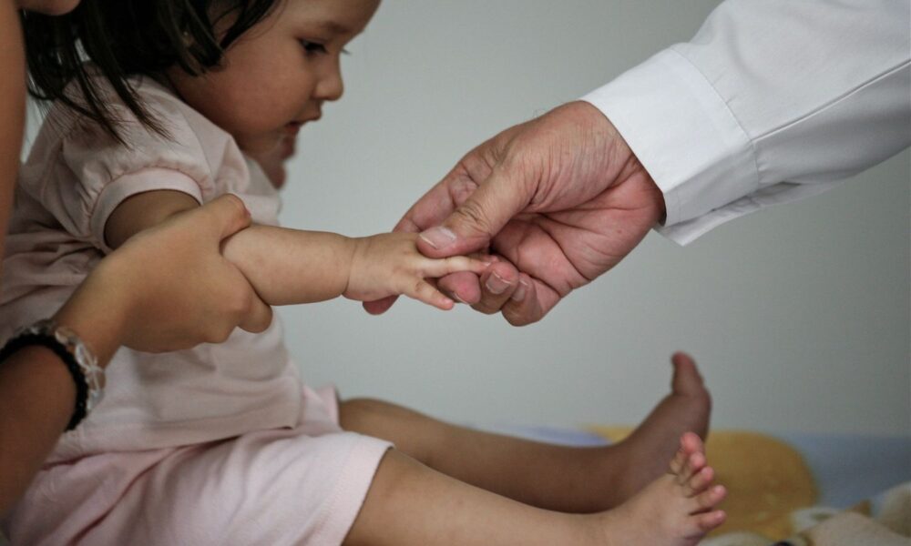 Baby girl at doctor