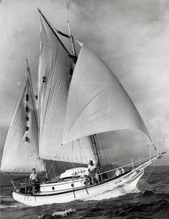 Black and white image of a sailboat called the Golden Rule, a 30 ft ketch, under sail. 