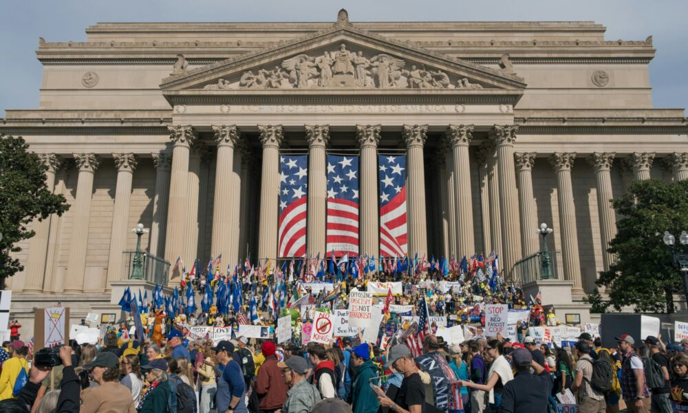 A crowd of protestors in front of the National Archives in Washington DC