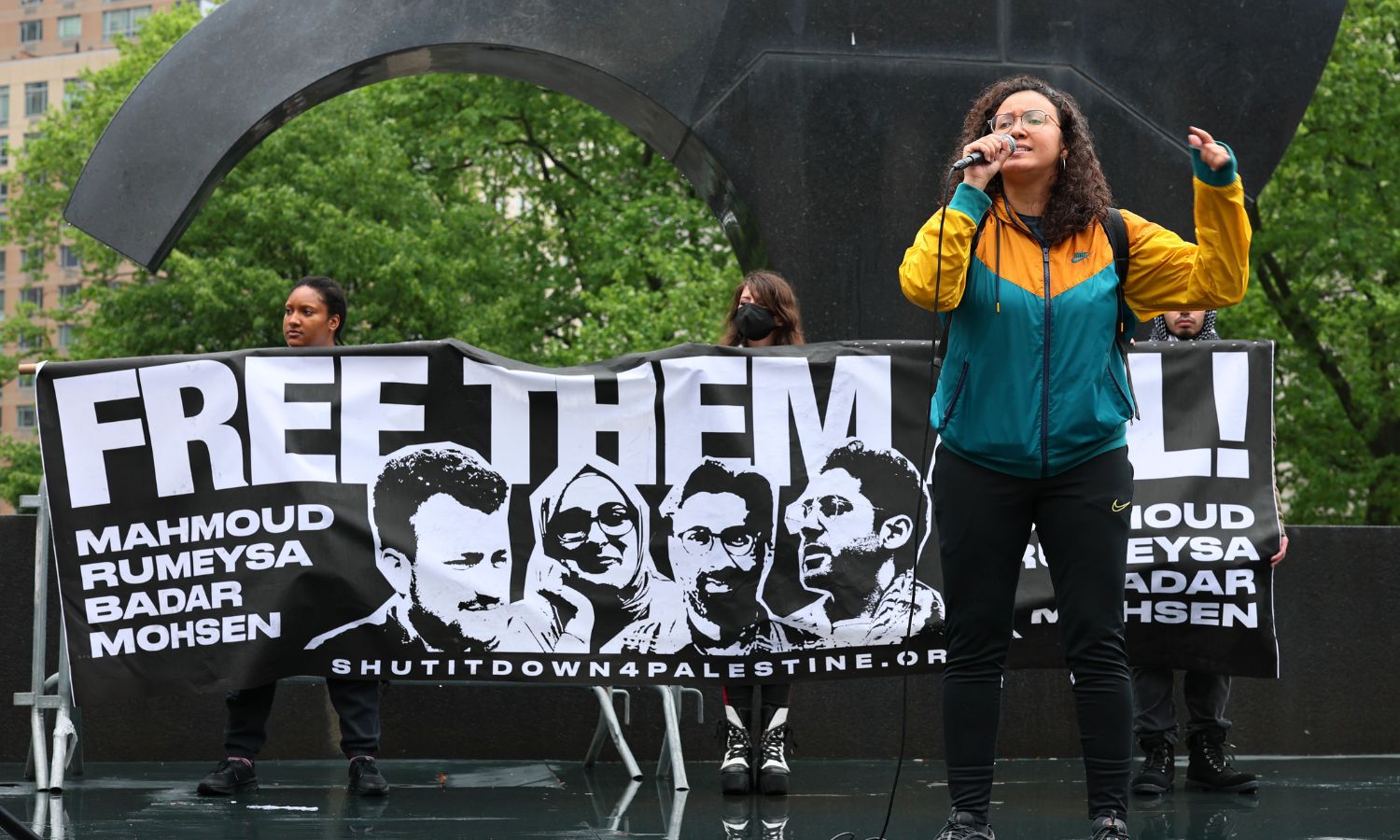 An organizer speaks at a rally for international students who were arrested by ICE, including Rümeysa Öztürk, then a PhD candidate studying child development at Tufts University.