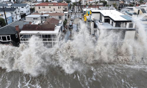 In an aerial view, a Pacific Ocean wave crashes into a seawall protecting beachside homes on September 7, 2026 in Long Beach, California. Heavy surf generated by offshore Hurricane Marie, amid record-breaking ocean heat and an emerging El Niño, caused coastal flooding and forced the evacuation of roughly 20 beachfront homes along the Long Beach Peninsula. Mario Tama/Getty Images